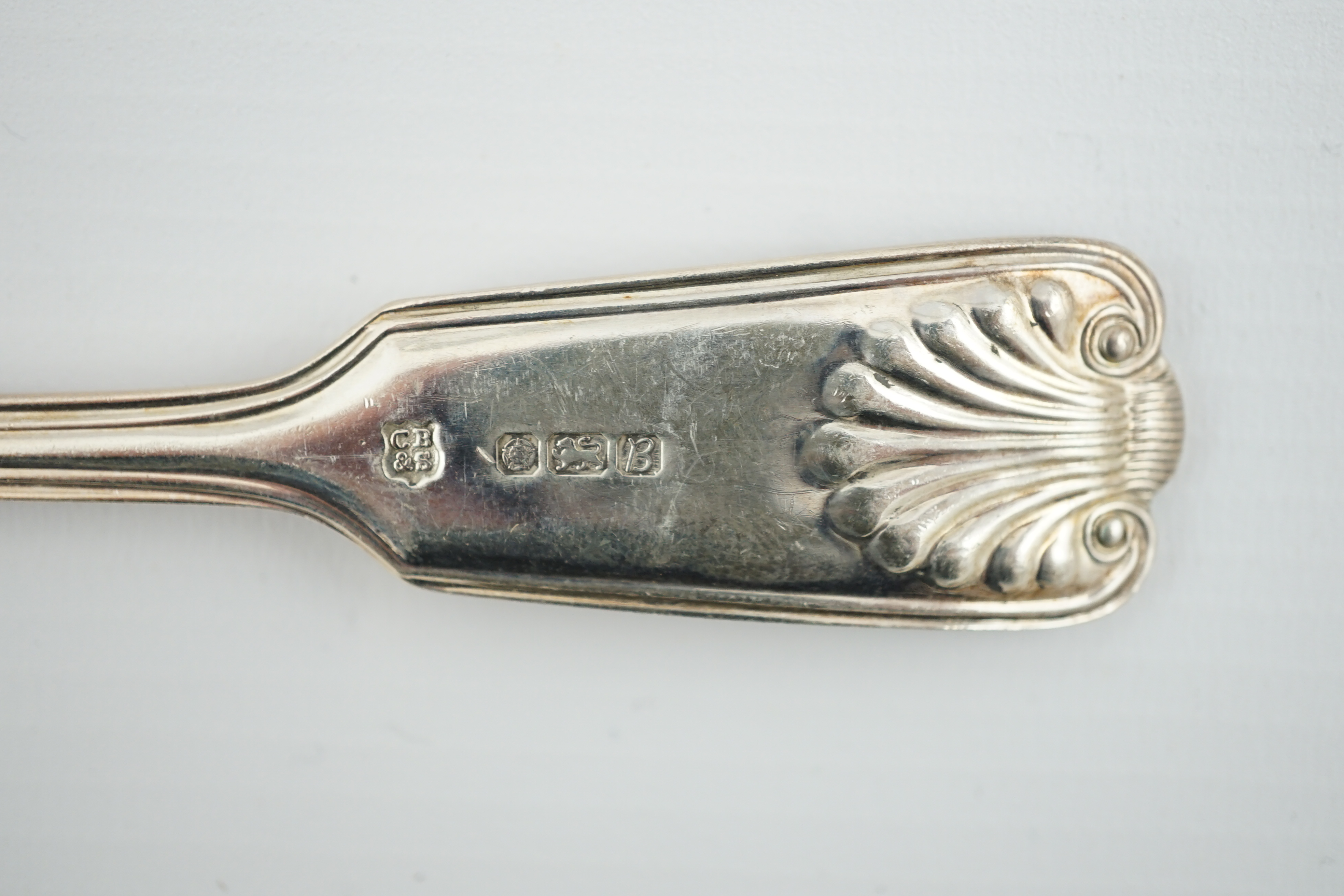 A matched part canteen of modern silver fiddle, thread and shell pattern cutlery, by Roberts & Belk and Cooper Brothers & Sons